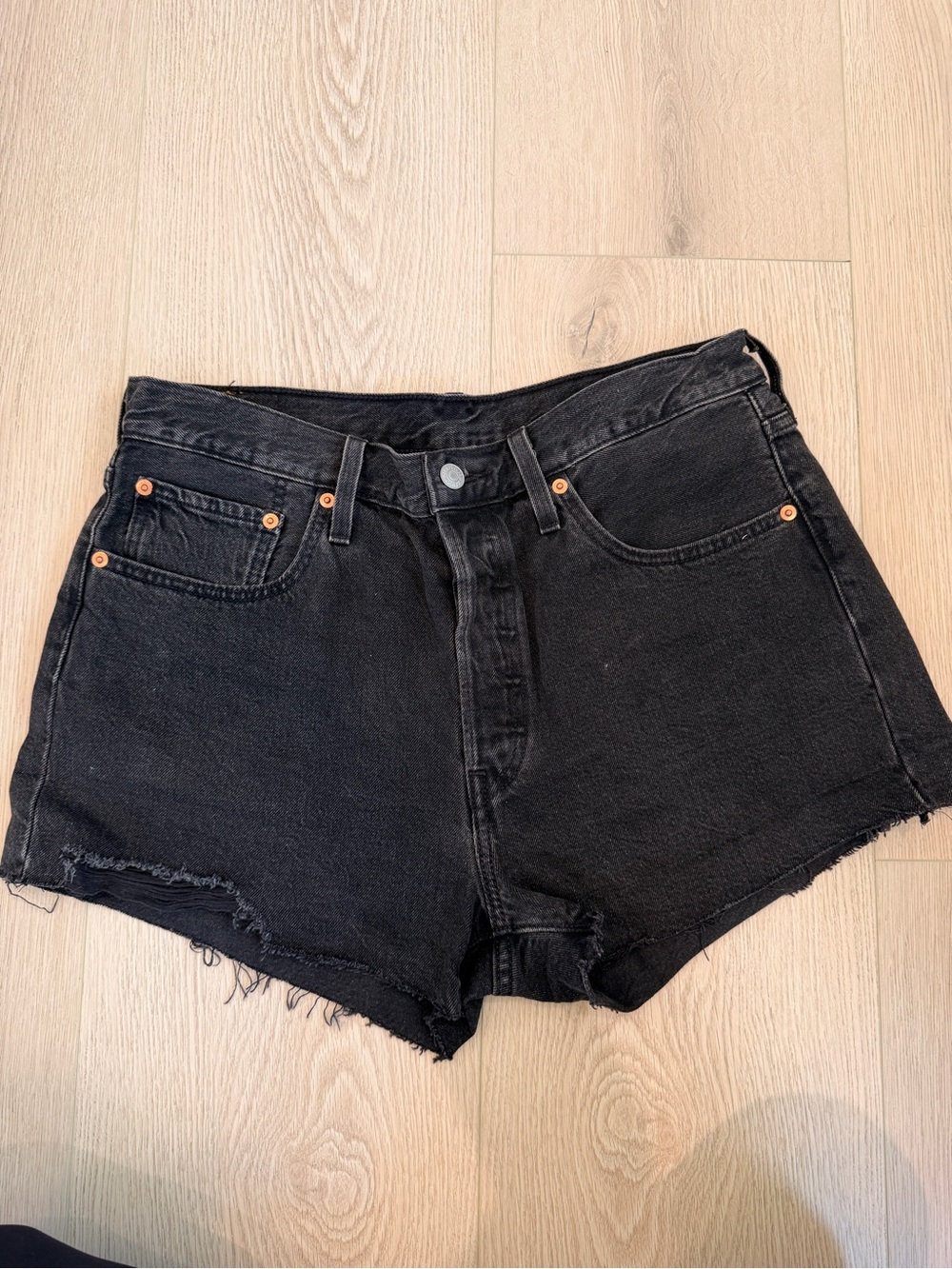 Levi’s High-Rise Black Denim Jean Shorts with Raw Hem